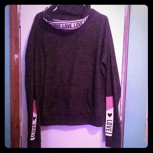 A long sleeve Love Turtle neck sweater